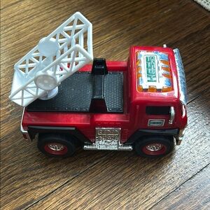 Bright Red Fire Truck Toy with Ladder and Rolling Wheels